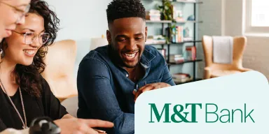 M&TBank logo + an image of three smiling people looking at laptop.